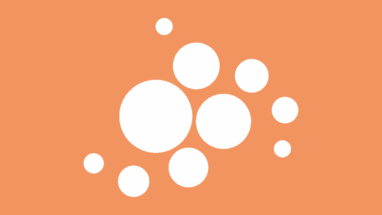 Vita prickar på orange bakgrund